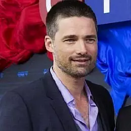 Warren Christie net worth